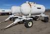Anhydrous tank and running gear 1,000 gallon capacity Pin hitch 11L 15SL tires Data plate unreadable...