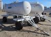 Anhydrous tank and running gear 1,000 gallon capacity Pin hitch 11L 15SL tires Data plate unreadable...
