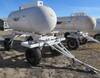 Anhydrous tank and running gear 1,000 gallon capacity Pin hitch 11L 15SL tires Data plate unreadable...