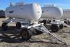 Anhydrous tank and running gear 1,000 gallon capacity Pin hitch 11L 15SL tires Data plate unreadable...