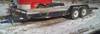 1995 Loadmaster utility trailer 20 L x 82 W wood deck Chain basket Chains are not included Bulkhead ...