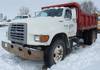 1997 Ford F700 dump truck 102,066 miles on odometer 7 0L V8 gas engine Five speed manual transmissio...