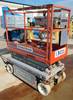 2006 Skyjack SJIII3215 electric scissor lift Power to platform 600 lbs capacity 5 L x 28 W platform ...