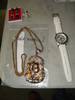 Assorted jewelry Watch Necklace Ring Kansas fork and spoon set Junction City Police Department 210 E...