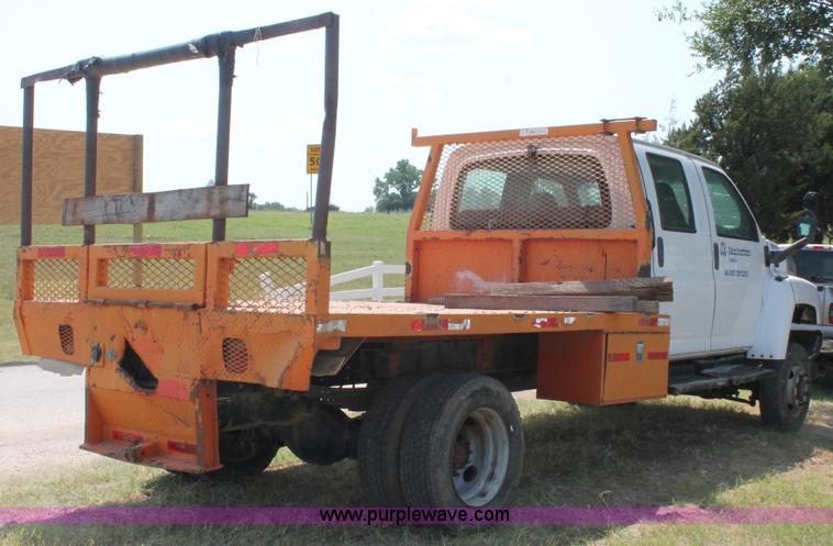 image for item I1556 2006 Chevrolet C5500 Crew Cab flat bed truck