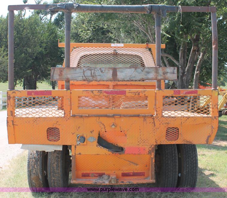 image for item I1556 2006 Chevrolet C5500 Crew Cab flat bed truck