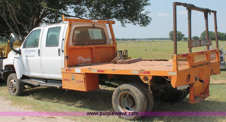 image for item I1556 2006 Chevrolet C5500 Crew Cab flat bed truck