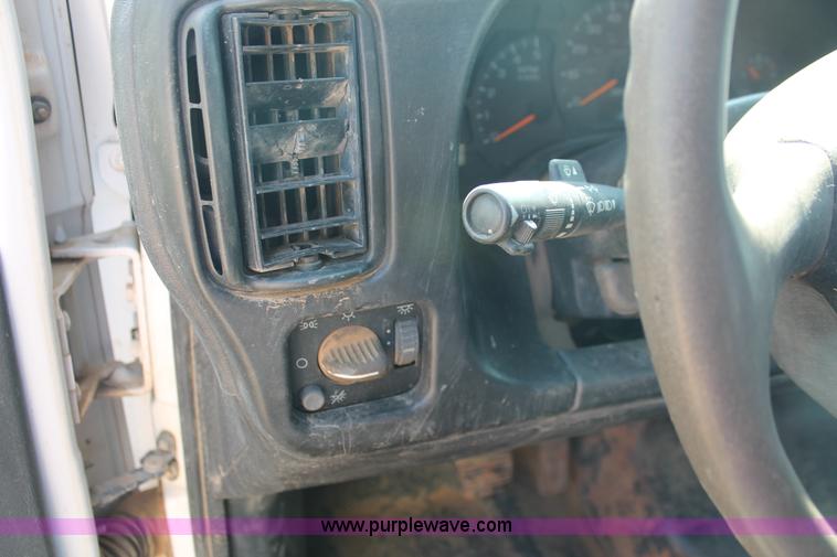 image for item I1556 2006 Chevrolet C5500 Crew Cab flat bed truck