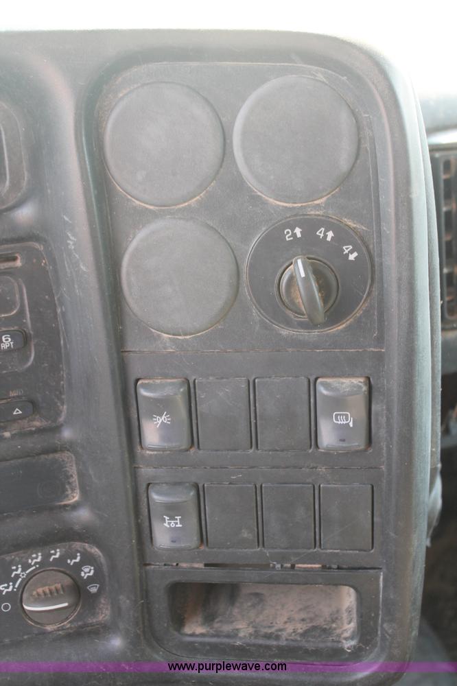 image for item I1556 2006 Chevrolet C5500 Crew Cab flat bed truck