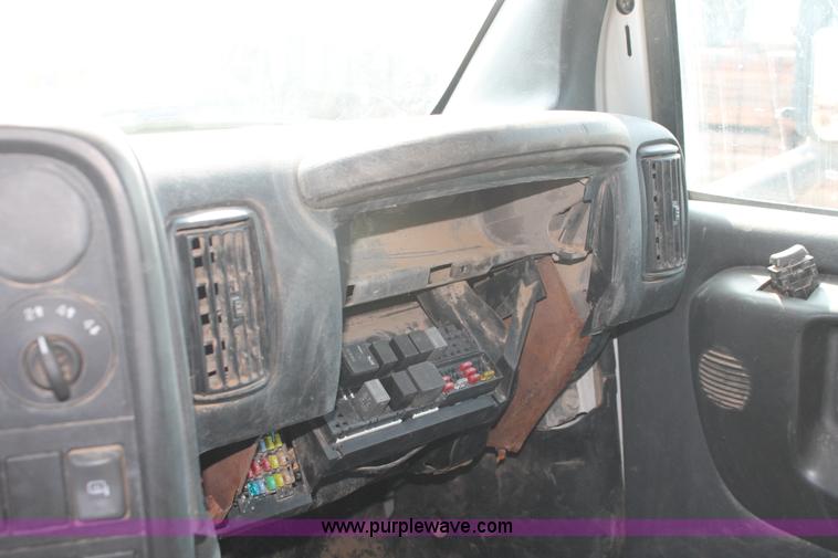 image for item I1556 2006 Chevrolet C5500 Crew Cab flat bed truck