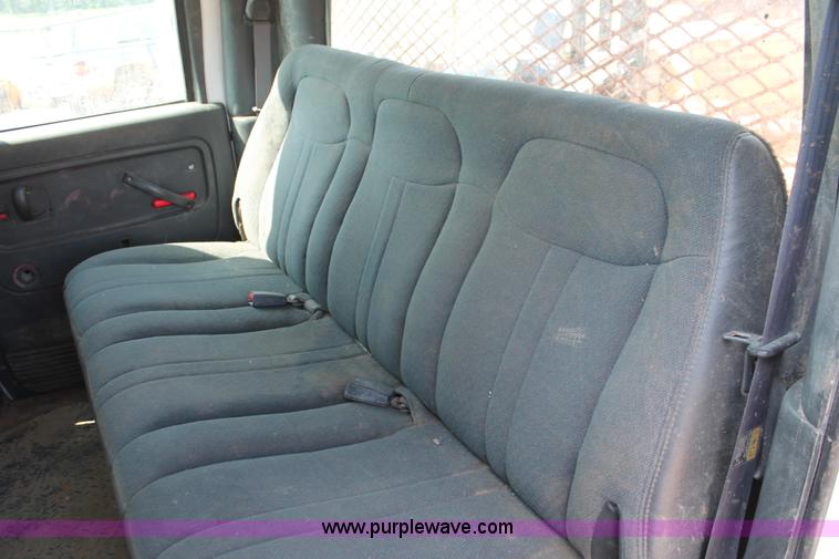 image for item I1556 2006 Chevrolet C5500 Crew Cab flat bed truck