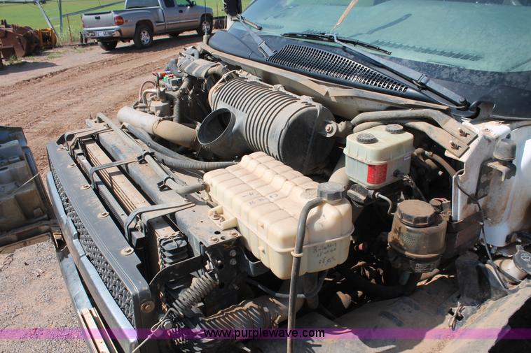 image for item I1556 2006 Chevrolet C5500 Crew Cab flat bed truck