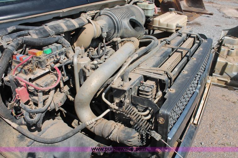 image for item I1556 2006 Chevrolet C5500 Crew Cab flat bed truck