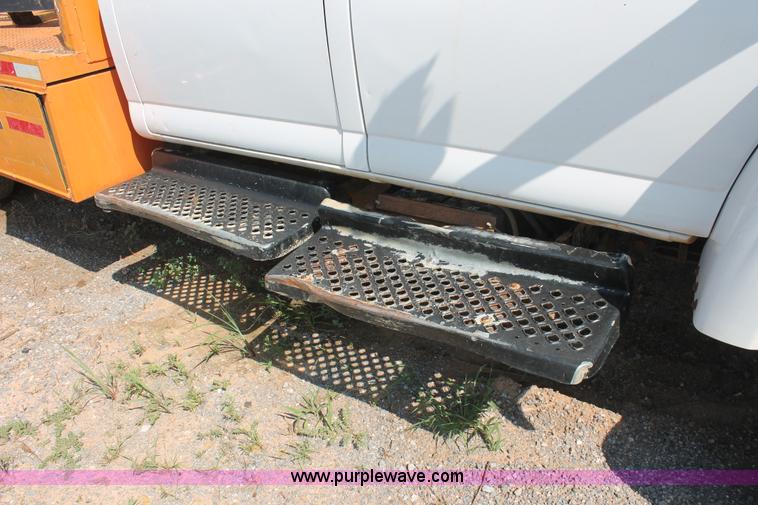 image for item I1556 2006 Chevrolet C5500 Crew Cab flat bed truck