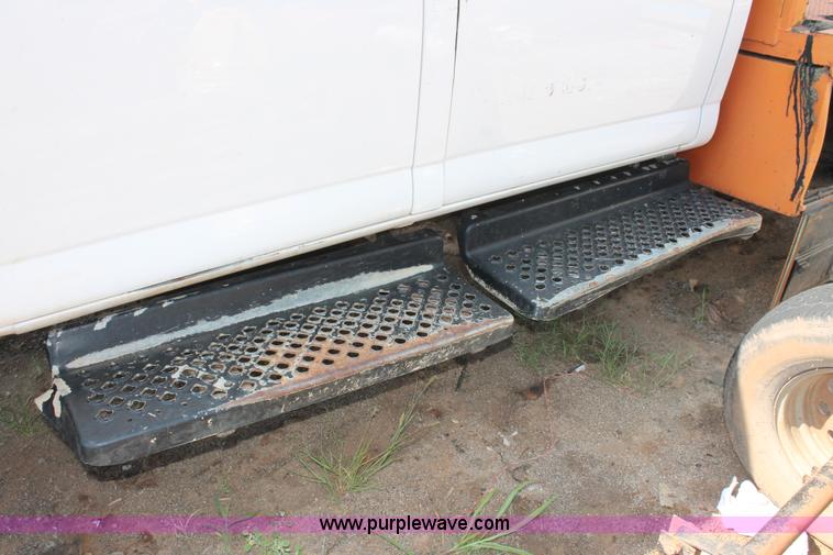 image for item I1556 2006 Chevrolet C5500 Crew Cab flat bed truck