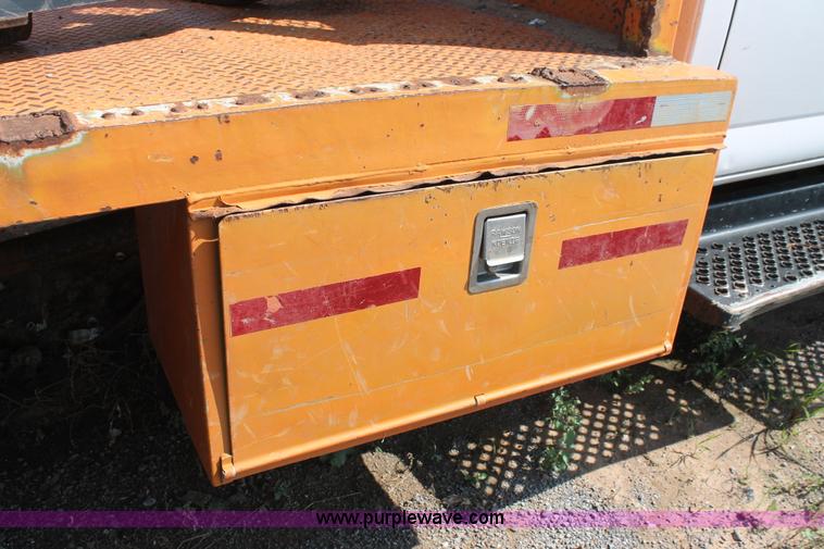 image for item I1556 2006 Chevrolet C5500 Crew Cab flat bed truck