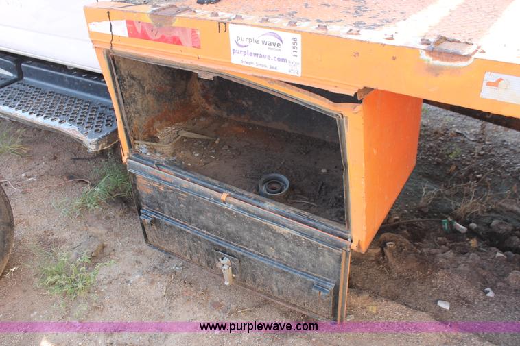 image for item I1556 2006 Chevrolet C5500 Crew Cab flat bed truck