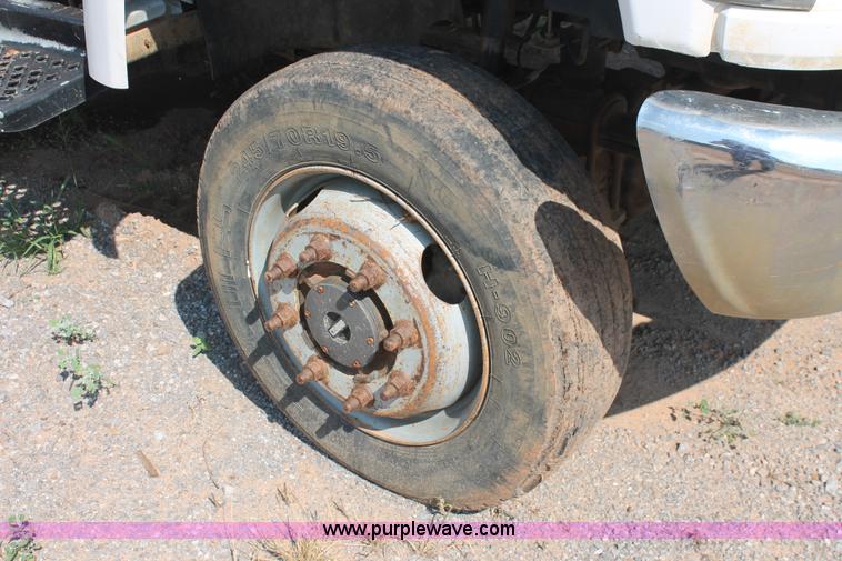 image for item I1556 2006 Chevrolet C5500 Crew Cab flat bed truck