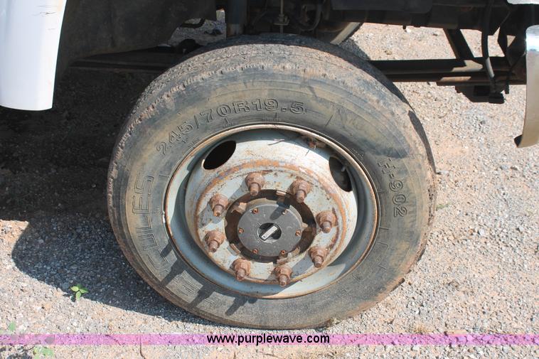 image for item I1556 2006 Chevrolet C5500 Crew Cab flat bed truck