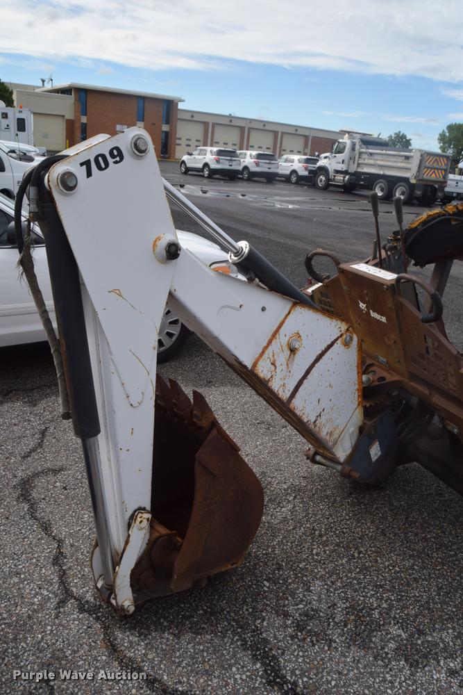 image for item AS9615 Bobcat 709 backhoe skid steer attachment