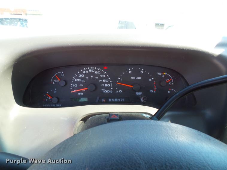 image for item J4792 2004 Ford F250 Super Duty XLT flatbed pickup truck