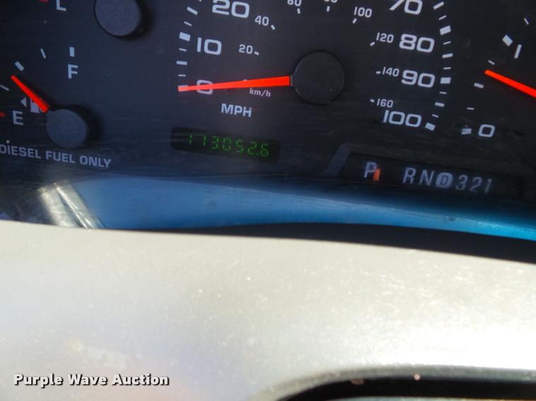 image for item J4792 2004 Ford F250 Super Duty XLT flatbed pickup truck