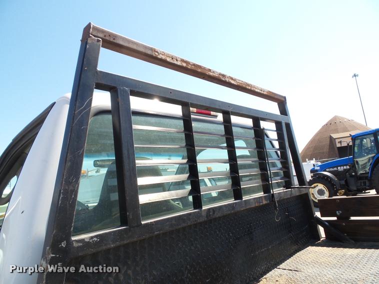 image for item J4792 2004 Ford F250 Super Duty XLT flatbed pickup truck