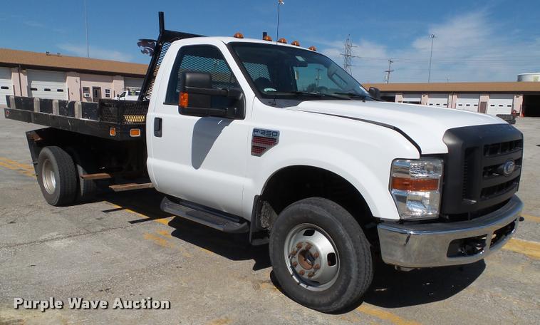 image for item J4801 2009 Ford F350 Super Duty XL flatbed pickup truck