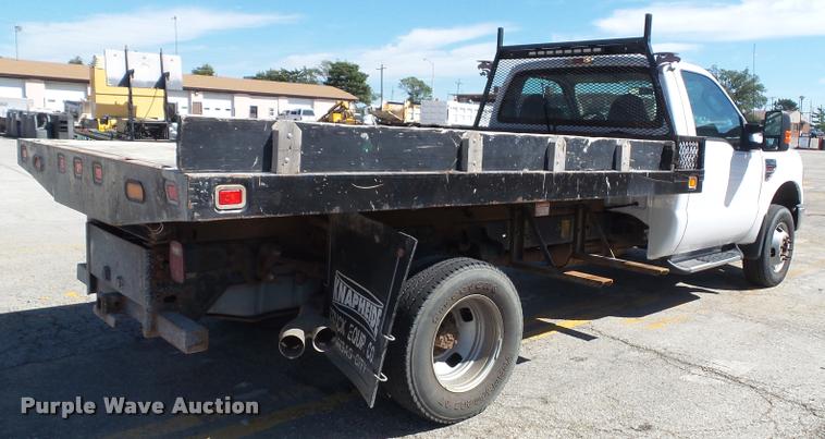 image for item J4801 2009 Ford F350 Super Duty XL flatbed pickup truck