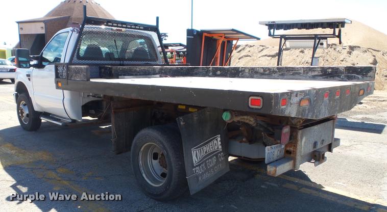 image for item J4801 2009 Ford F350 Super Duty XL flatbed pickup truck