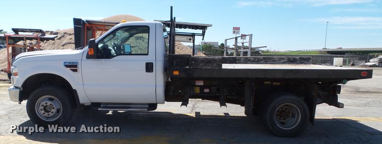 image for item J4801 2009 Ford F350 Super Duty XL flatbed pickup truck