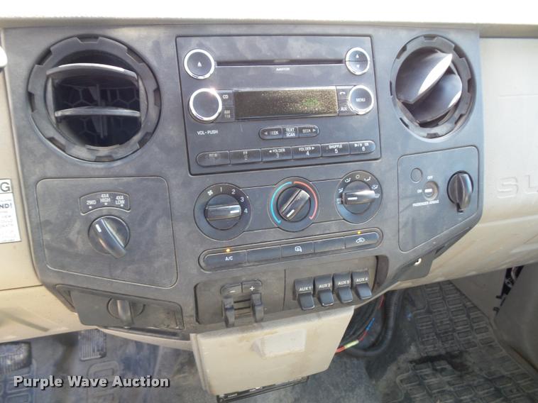 image for item J4801 2009 Ford F350 Super Duty XL flatbed pickup truck