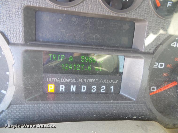 image for item J4801 2009 Ford F350 Super Duty XL flatbed pickup truck