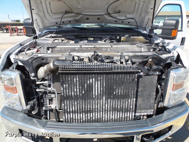 image for item J4801 2009 Ford F350 Super Duty XL flatbed pickup truck