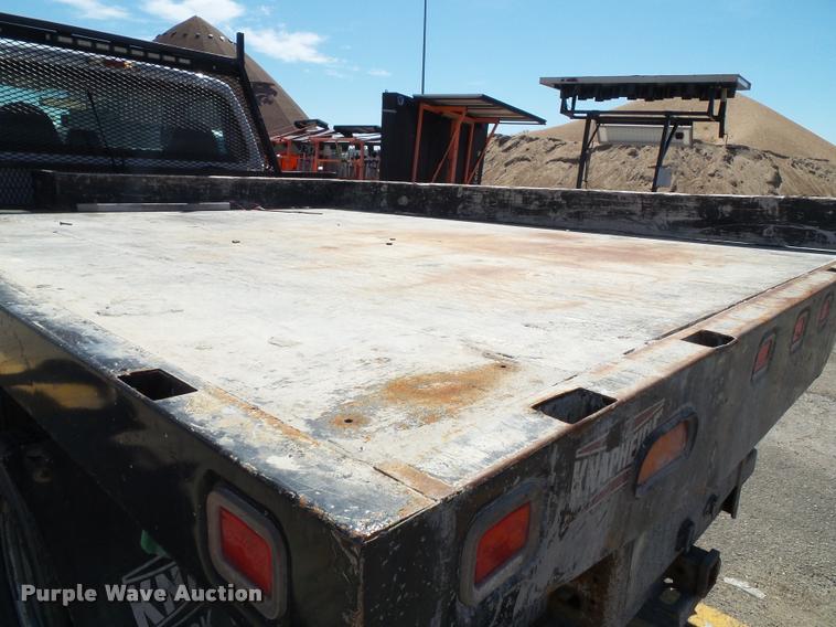 image for item J4801 2009 Ford F350 Super Duty XL flatbed pickup truck