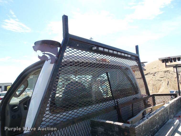 image for item J4801 2009 Ford F350 Super Duty XL flatbed pickup truck
