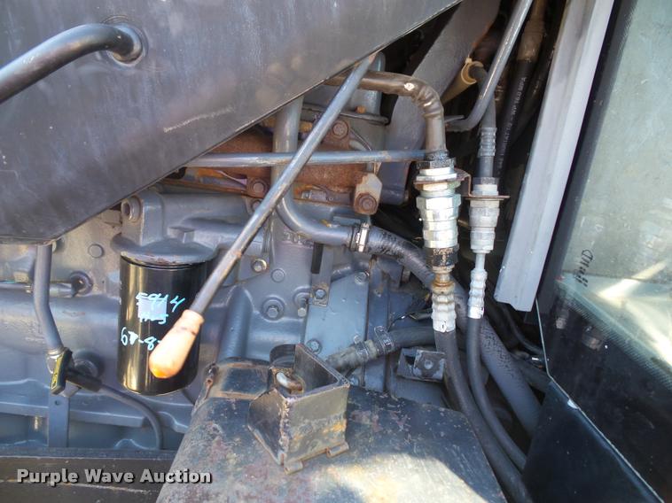 image for item J4807 1997 New Holland 8260 MFWD tractor