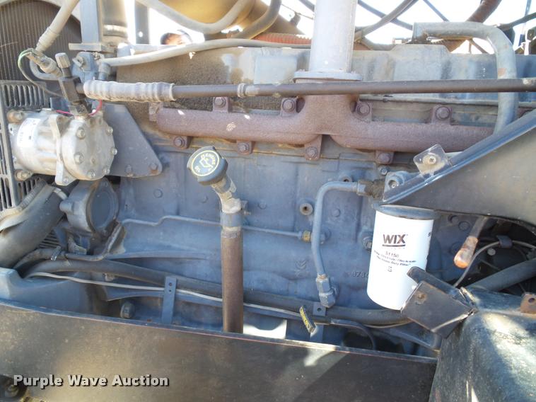 image for item K8230 1997 New Holland 8260 MFWD tractor