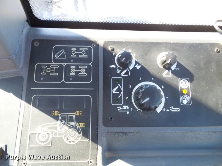 image for item K8233 1998 New Holland 8260 MFWD tractor