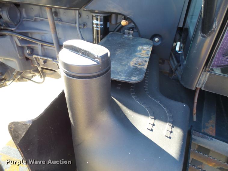 image for item K8233 1998 New Holland 8260 MFWD tractor