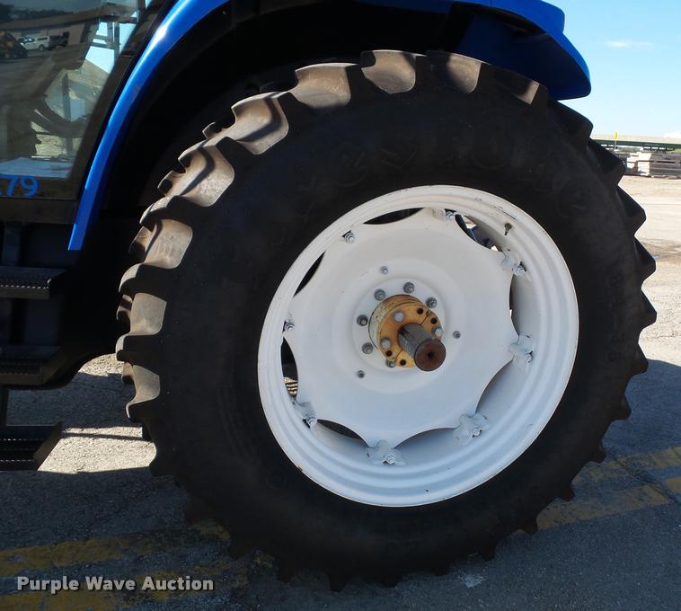 image for item K8233 1998 New Holland 8260 MFWD tractor