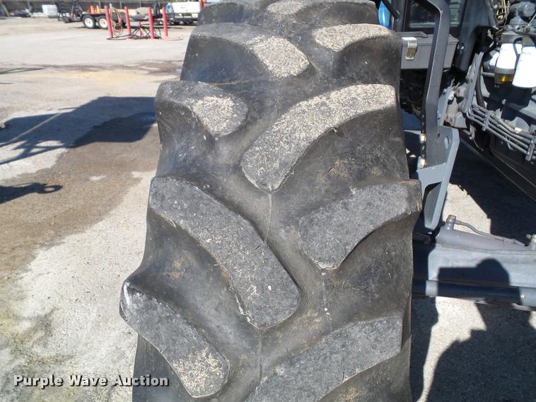 image for item K8233 1998 New Holland 8260 MFWD tractor