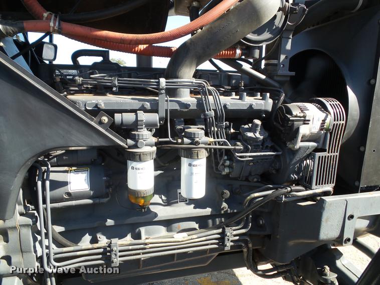 image for item K8233 1998 New Holland 8260 MFWD tractor