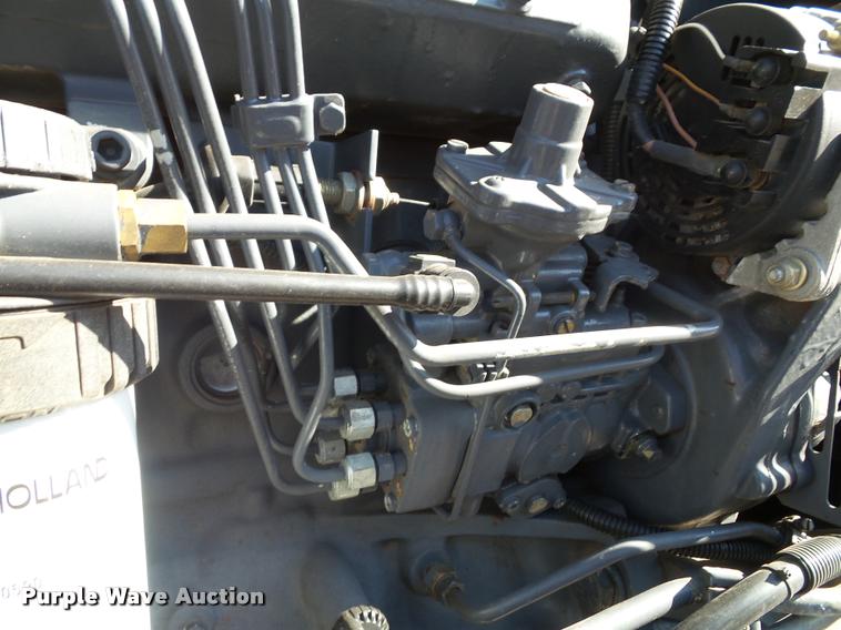 image for item K8233 1998 New Holland 8260 MFWD tractor