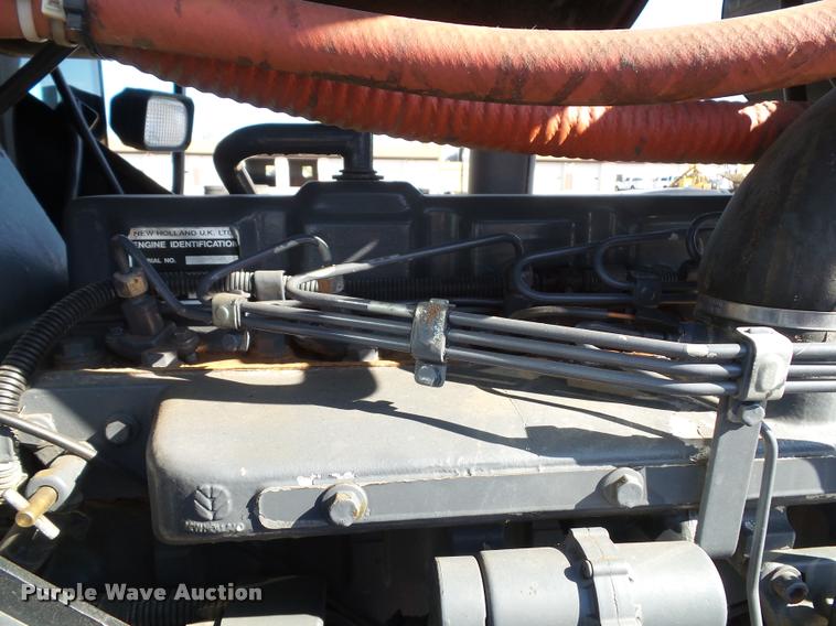 image for item K8233 1998 New Holland 8260 MFWD tractor