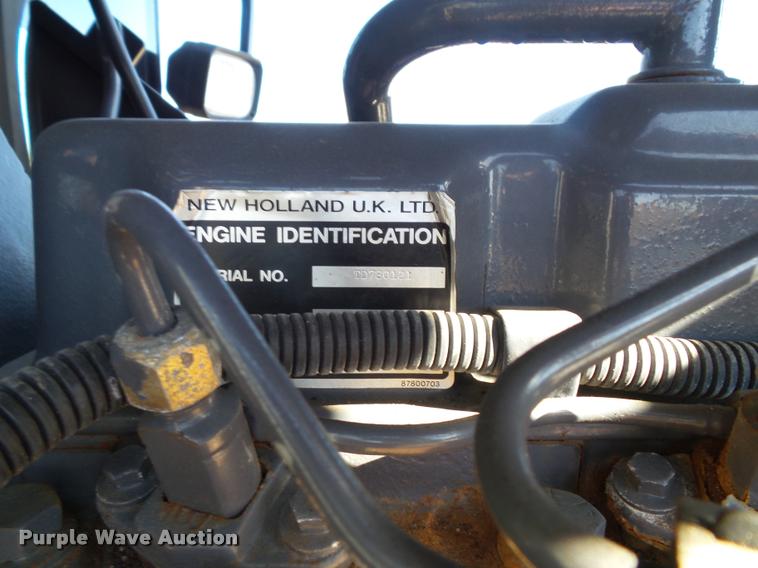 image for item K8233 1998 New Holland 8260 MFWD tractor