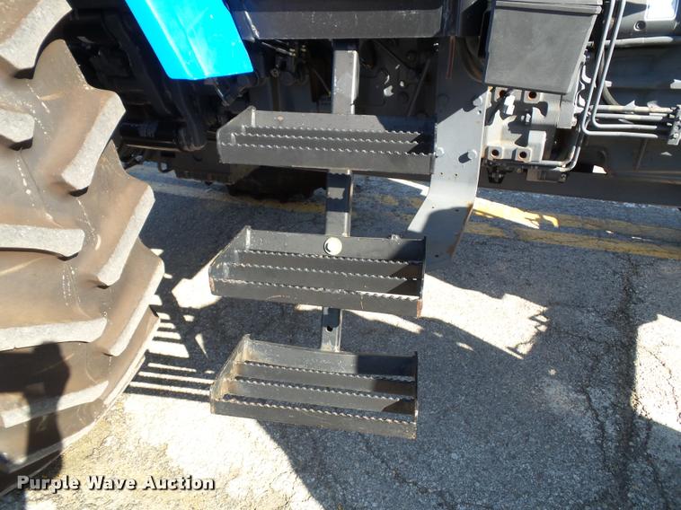 image for item K8233 1998 New Holland 8260 MFWD tractor