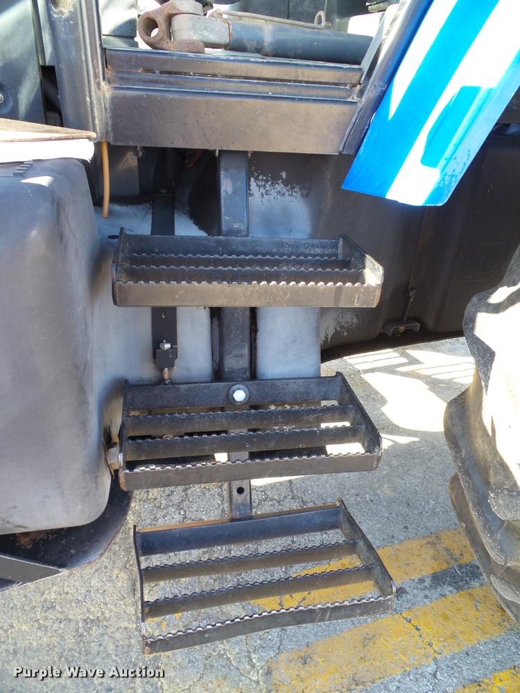 image for item K8234 1998 New Holland 8260 MFWD tractor