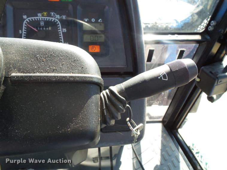 image for item K8234 1998 New Holland 8260 MFWD tractor