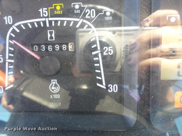 image for item K8234 1998 New Holland 8260 MFWD tractor